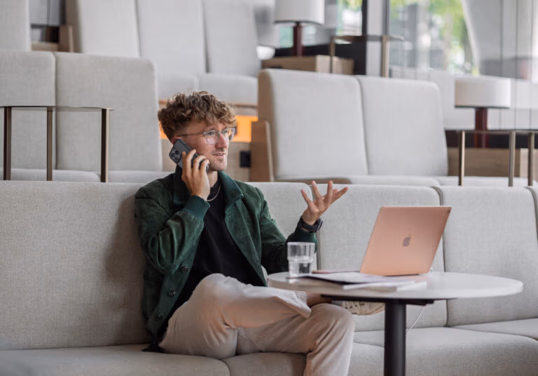 Matthias on phone and in front of Computer